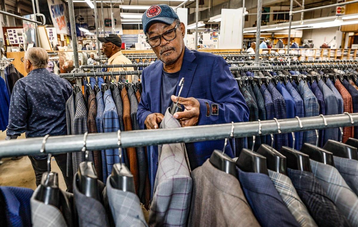 Larry McCall, 73, of Miami Gardens, shops at Austin Burke in Miami, Florida on Friday, Jan. 10, 2025. The men’s clothing retail store, opened in 1955 by the late namesake founder, will soon close.