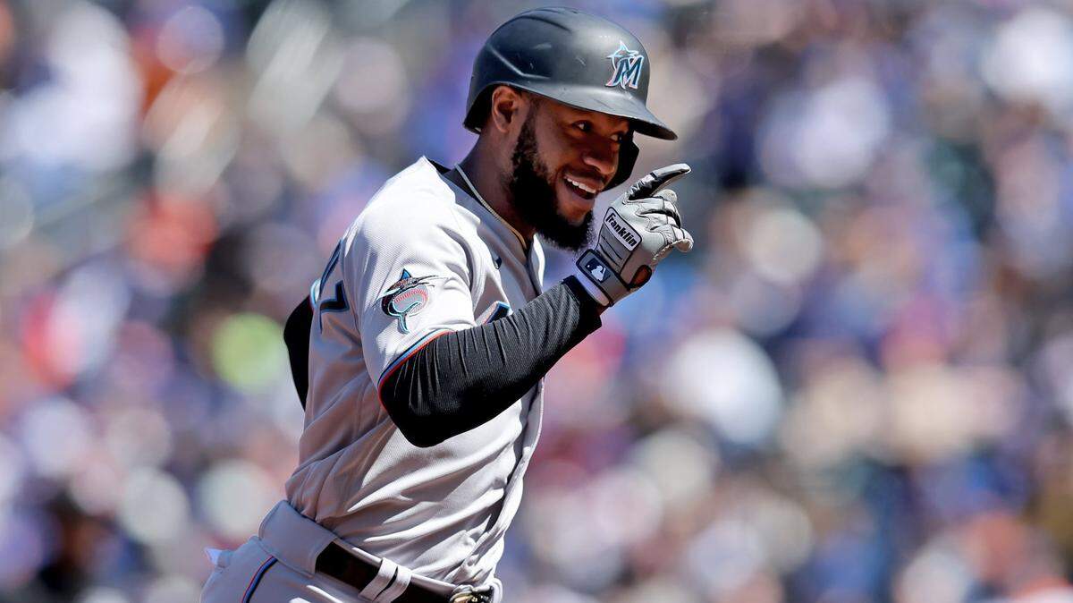 Miami Marlins left fielder Bryan De La Cruz (14) rounds the bases after hitting a three run home run against the New York Mets during the first inning at Citi Field on Sunday, April 9, 2023.