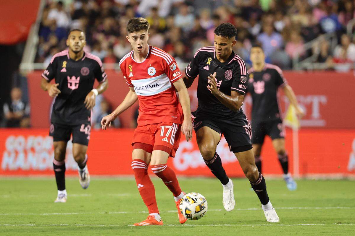 Aug 31, 2024; Chicago, Illinois, USA; Chicago Fire FC midfielder Brian Gutierrez (17) and Inter Miami CF defender Ian Fray (17) battle for the ball in the first half at Soldier Field. Mandatory Credit: Mike Dinovo-USA TODAY Sports