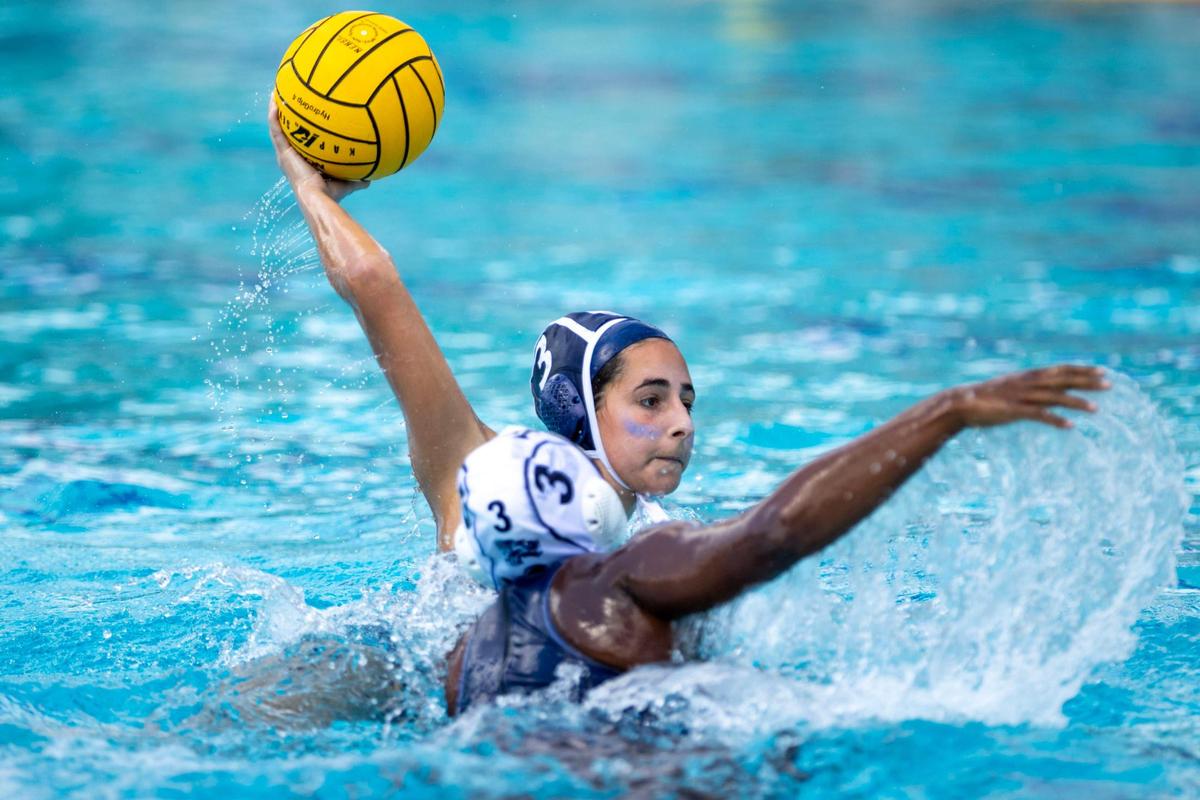 Gulliver Prep attacker Giorgia Pascual (15) shoots the ball while defended by Lake Nona defender Illeana West (3) during the 2023 Girl’s State Championship at Belen Gian Zumpano Aquatic Center in Miami, Florida, on Saturday, April 15, 2023.