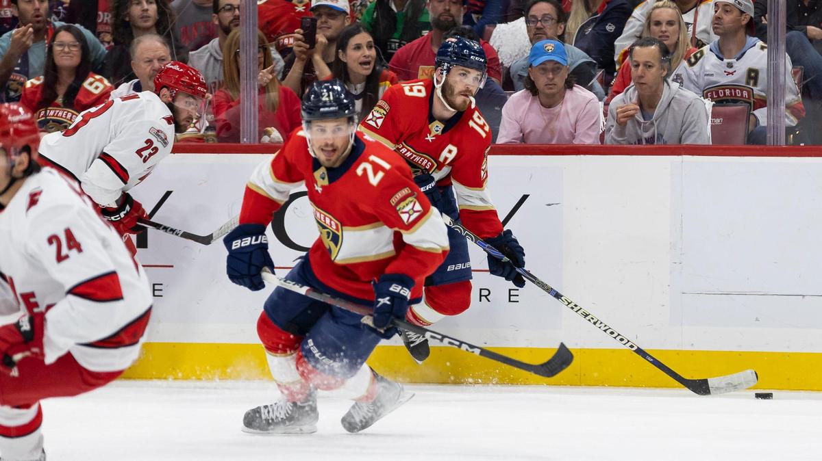 Florida Panthers left wing Matthew Tkachuk (19) and center Nick Cousins (21) skate with the puck against the Carolina Hurricanes in the first period of Game 3 of the NHL Stanley Cup Eastern Conference finals series at the FLA Live Arena on Monday, May 22, 2023 in Sunrise, Fla.