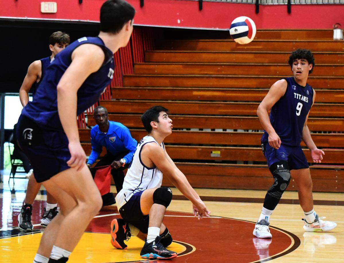 True North Classical junior libero Alejandro Ruiz digs out a shot in an FHSAA Class 1A state semifinal against Tampa SLAM on Thursday at Polk State College in Winter Haven.