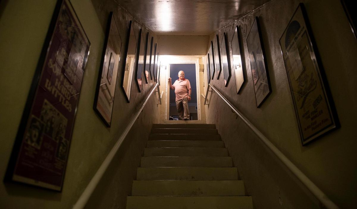Attorney A.J. Barranco at the top of the stairs to his basement, a rare option in flat Miami-Dade. His home along South Bayshore Drive home in Coconut Grove is built on one of Miami-Dade’s highest pieces of ground.