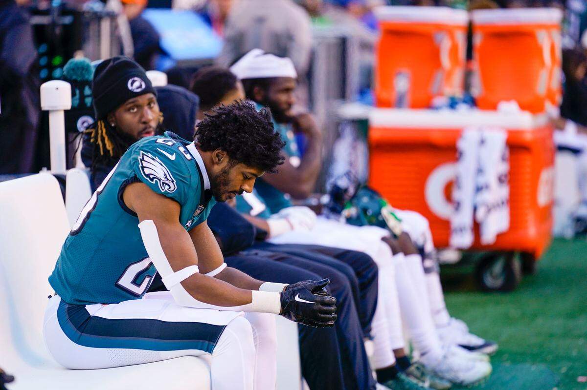 Philadelphia Eagles cornerback Josh Jobe sits in the bench in the second half of an NFL football game against the New Orleans Saints in Philadelphia, Sunday, Jan. 1, 2023. (AP Photo/Matt Slocum)