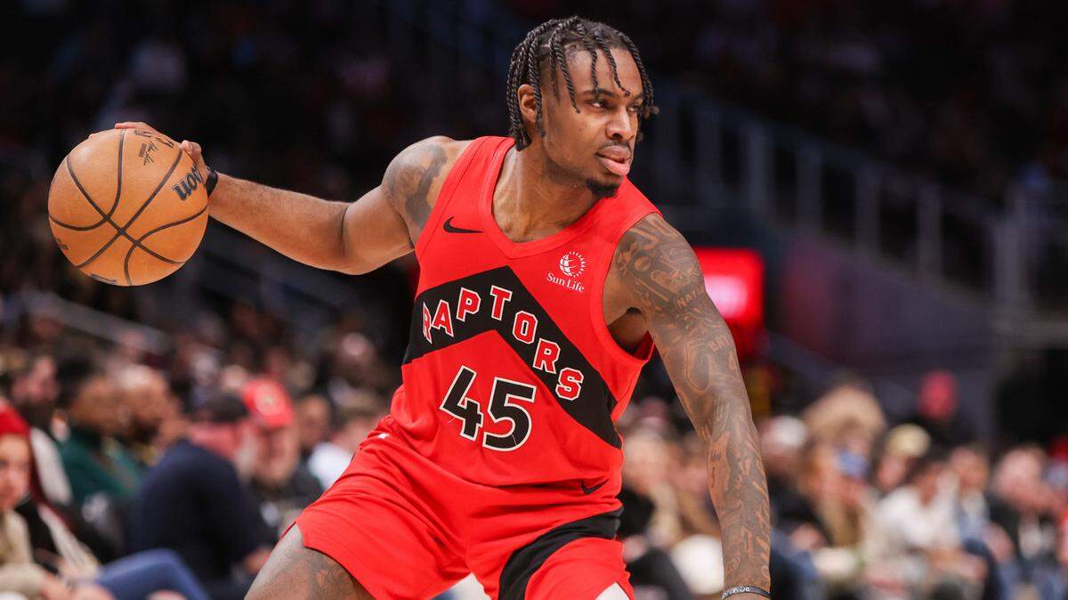 Toronto Raptors guard Davion Mitchell (45) dribbles against the Atlanta Hawks in the fourth quarter at State Farm Arena.