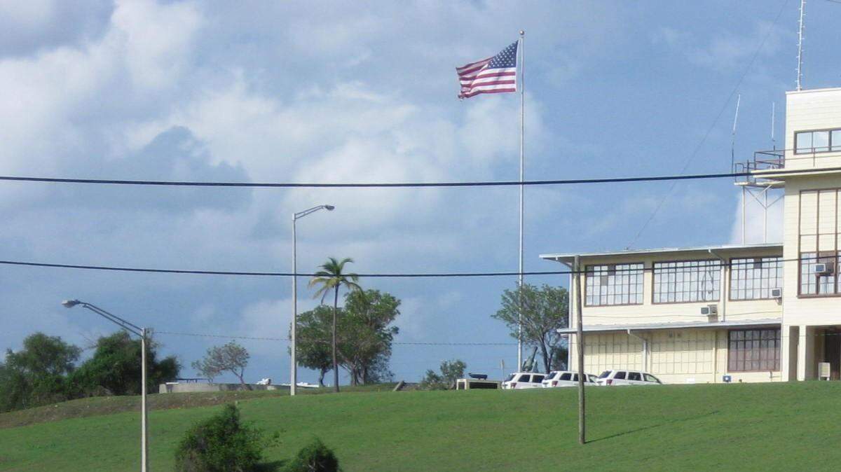 The military commissions tribunal building on Monday, Sept. 20, 2010, the eve of Sudanese captive Noor Uthman Mohammed's hearing in this image cleared by a military escort, an enlisted sailor, operating under the new Department of Defense censorship ground rules.