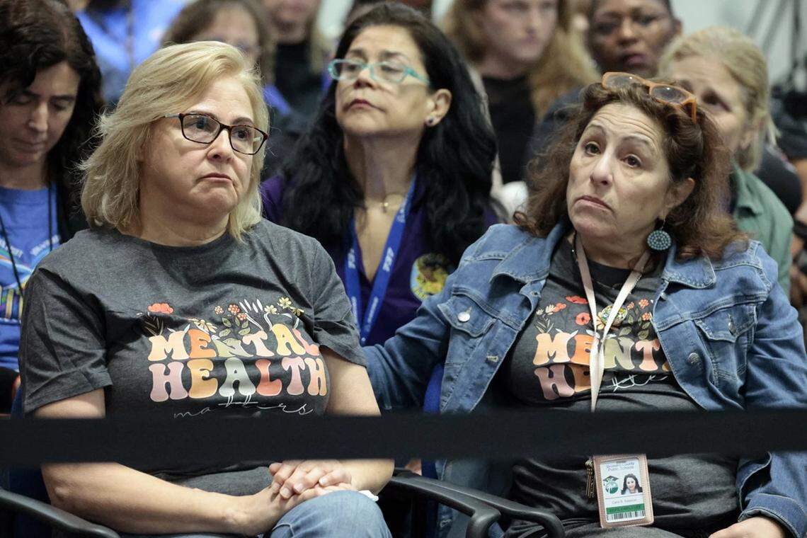 Audience members react to public comments about proposed job cuts during a Broward County School Board workshop in Fort Lauderdale on Tuesday, April 21.