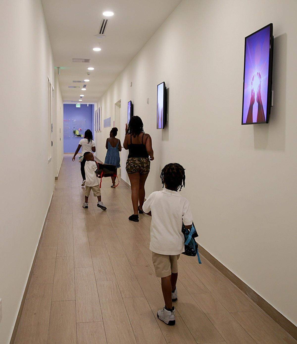 The Lotus House shelter for homeless women and children in Overtown was dedicated just under a year ago.