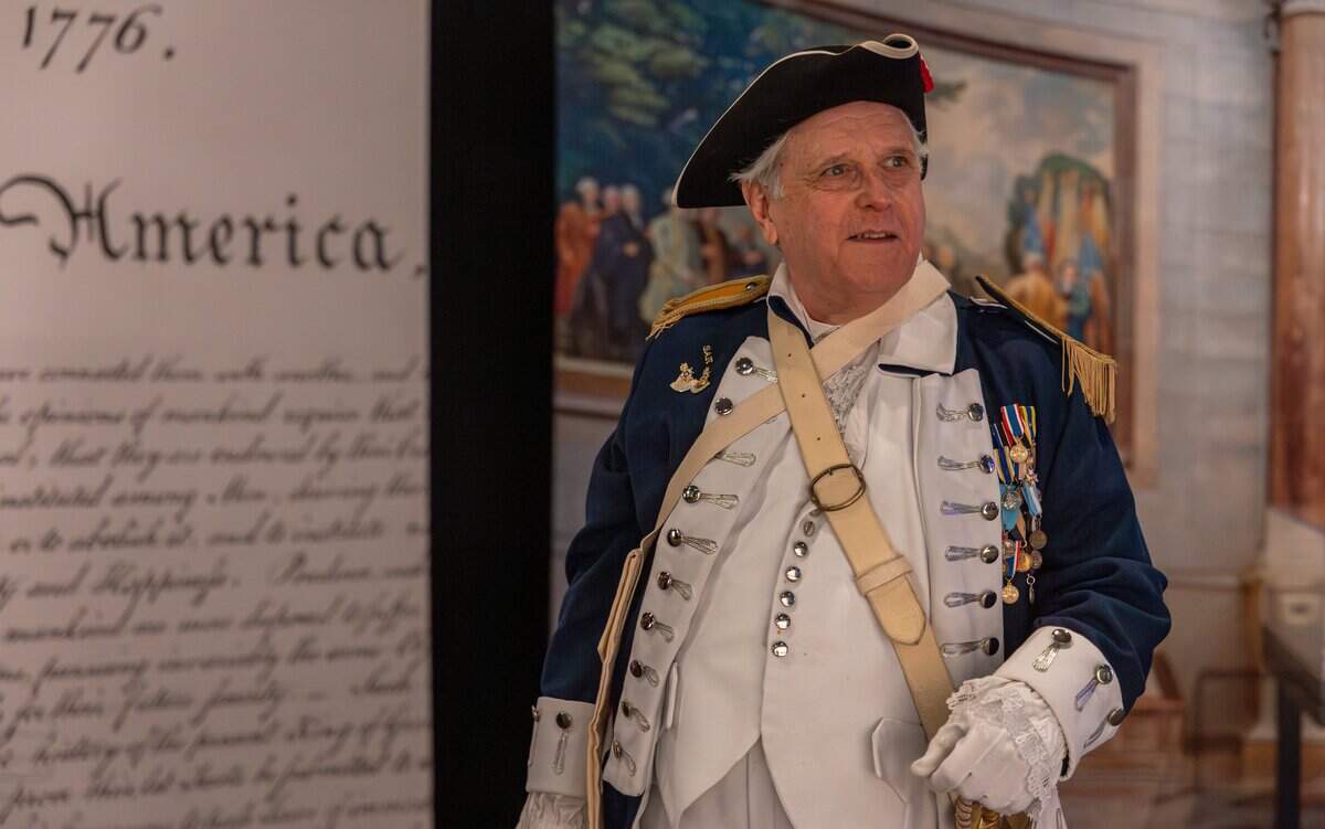 David Mitchell, commander of the Color Guard for the Sons of the American Revolution Miami Chapter, views the “Documents that Forged a Nation” exhibit during a press preview at the Museum of Miami in Miami, Fla., on Wednesday, June 17, 2026.