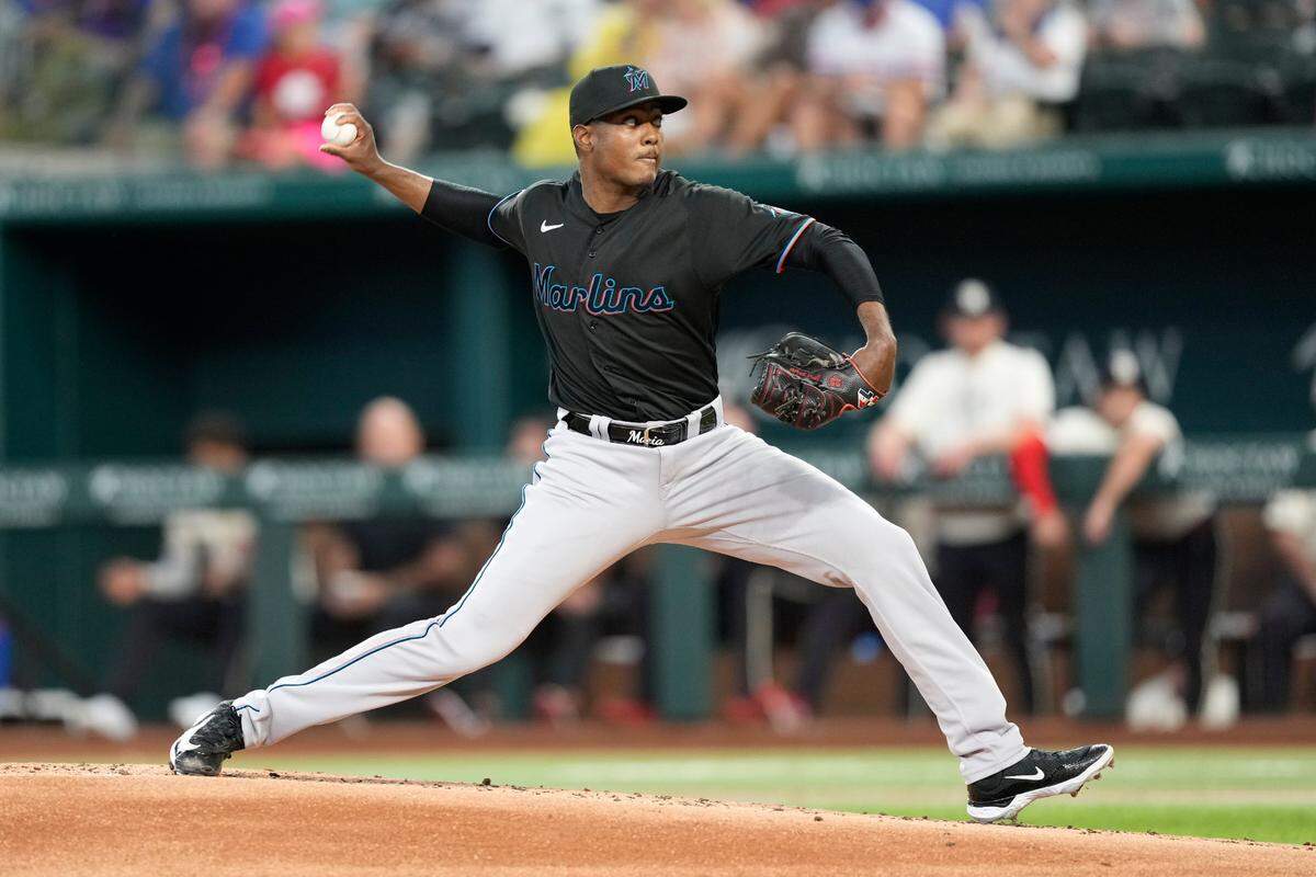 Aug 5, 2023; Arlington, Texas, USA; Miami Marlins starting pitcher George Soriano (62) delivers a pitch the the Texas Rangers during the first inning at Globe Life Field. Mandatory Credit: Jim Cowsert-USA TODAY Sports