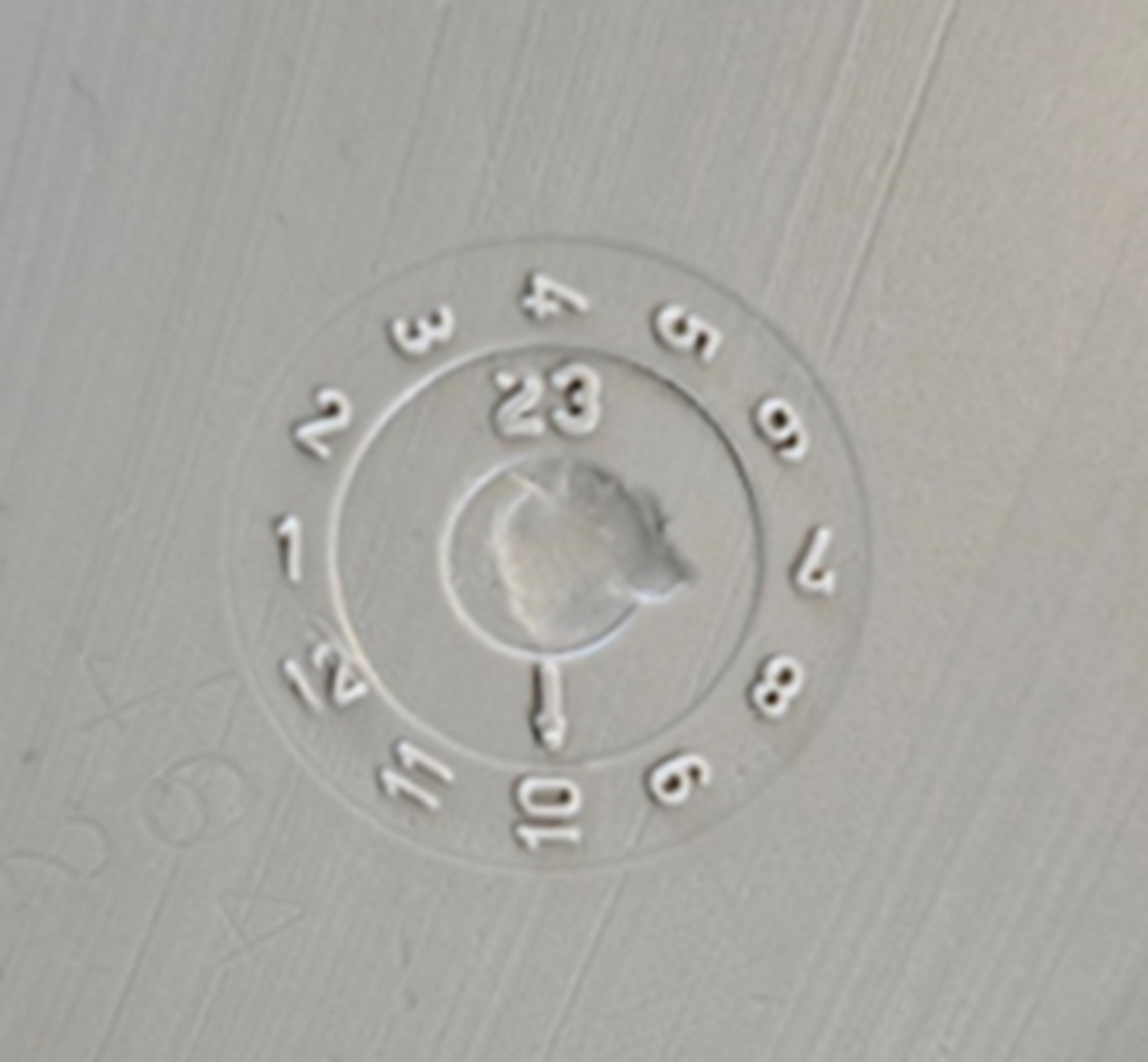 The date code on the Igloo 90 Qt. Flip & Tow Rolling Coolers. The “23” indicates the year the cooler was made and the arrow points to “10” for the 10th month. So, this cooler was made in October 2023.