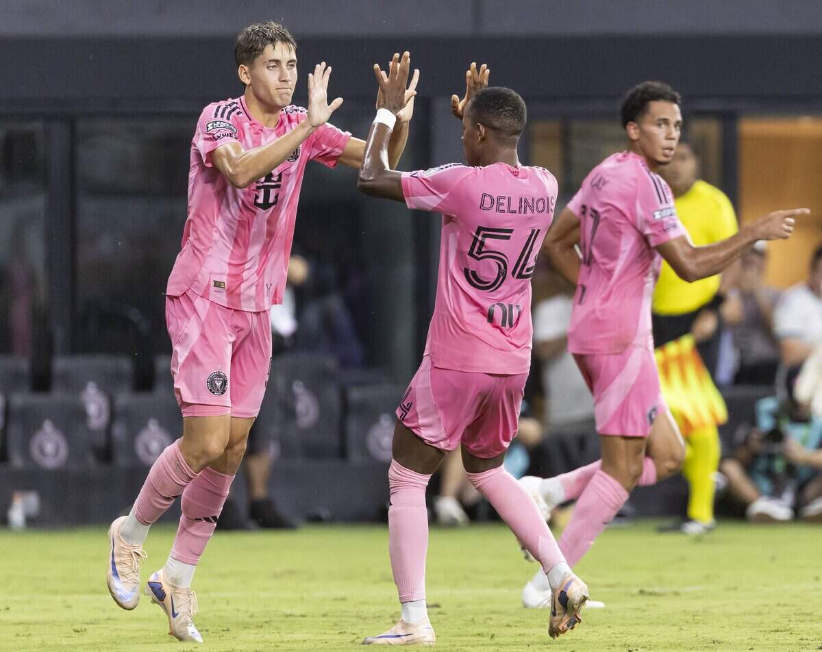 Inter Miami forward Dániel Pintér (56) celebrates with forward Lovend's Delinois (54) after scoring a goal against León in the first half of their Leagues Cup 2026 soccer match at Nu Stadium on Wednesday, Aug. 12, 2026, in Miami, Fla.