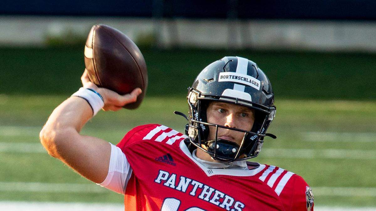 Florida International University quarterback Max Bortenschlager (12) throws the ball down field during the Annual FIU Football Spring Showcase at Riccardo Silva Stadium in Miami, Florida, on Friday, April 16, 2021.