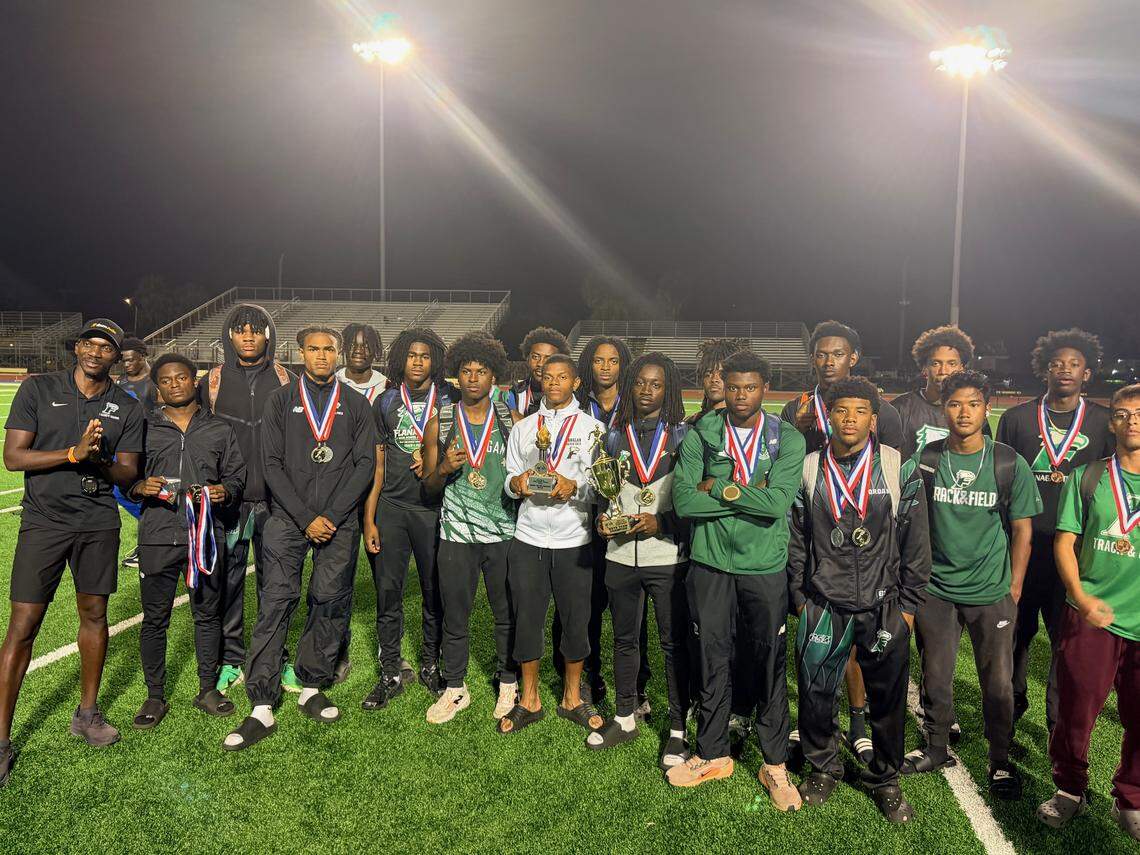 The Flanagan boys’ track and field team celebrates its third consecutive BCAA track and field title on Friday at Dillard High School in Fort Lauderdale, Fla.