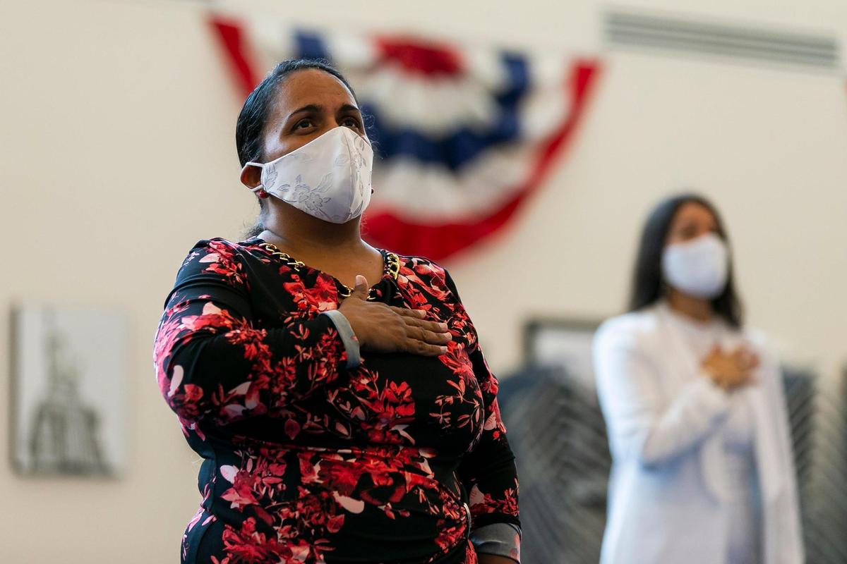 Jackeline Eugenia Reyes Santana participates in a naturalization ceremony for people becoming American citizens at the U.S. Citizenship & Immigration Services District Office in Miami, Florida on Friday, October 2, 2020.