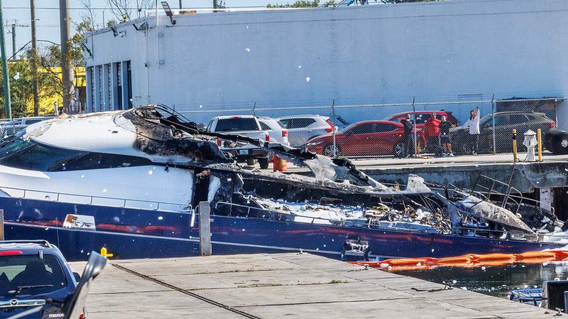 Scene of a destroyed boat that caught on fire around 3:30 a.m. in the area off Northwest North River Drive near the Miami Marine Center marina and Jones Boat Yard, on Friday March 7, 2025.