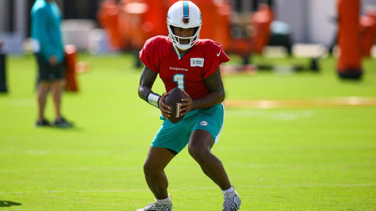 Miami Dolphins quarterback Tua Tagovailoa (1) drops back during training camp at Baptist Health Training Complex in Miami Gardens, Florida, on Tuesday, August 20, 2024.