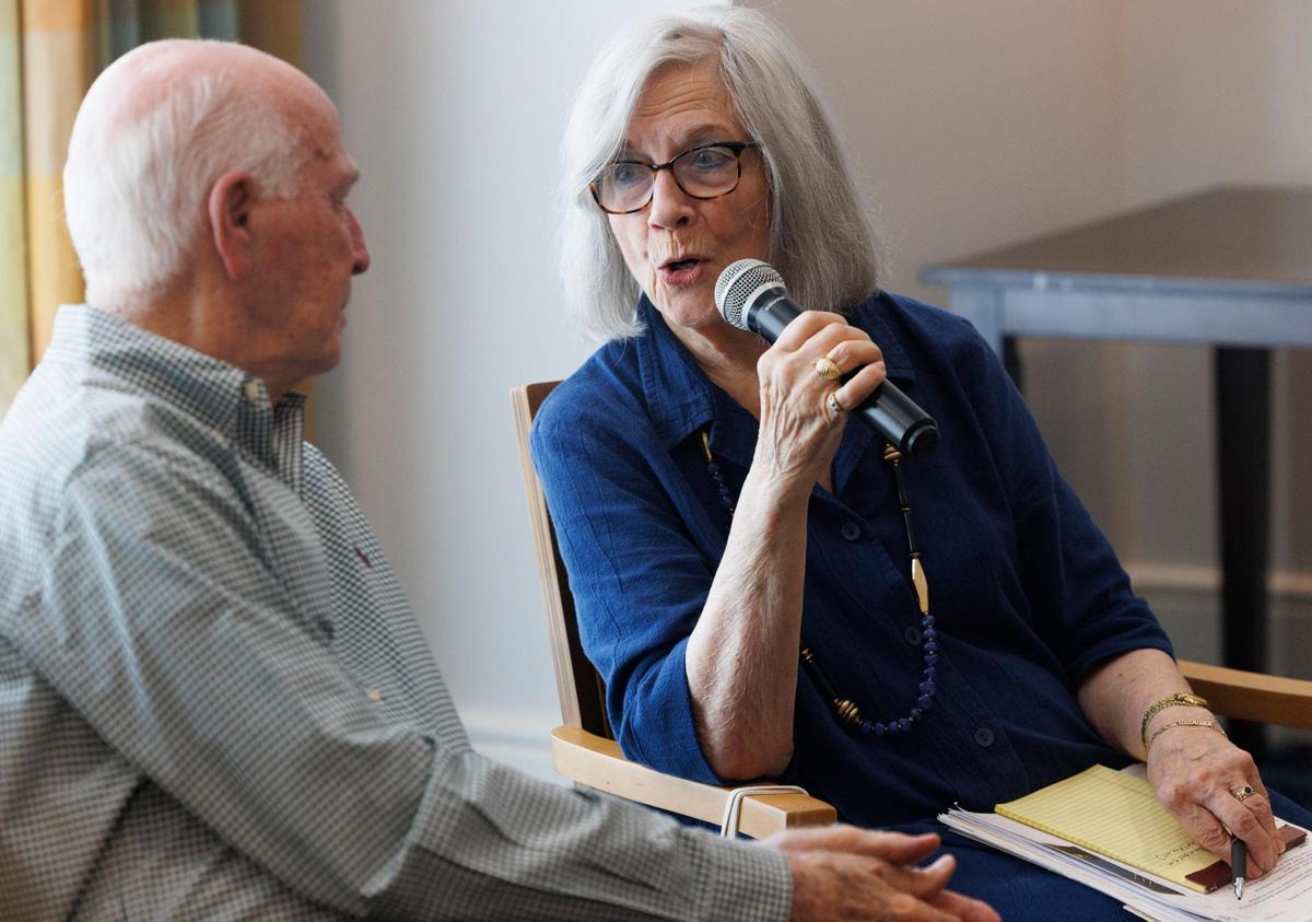 Minister Priscilla Felisky Whitehead, right, responds to Rabbi Ralph Kingsley during an interfaith conversation series they organized. They discussed God, life and how religion connects to current events, like the devastating Texas flood.
