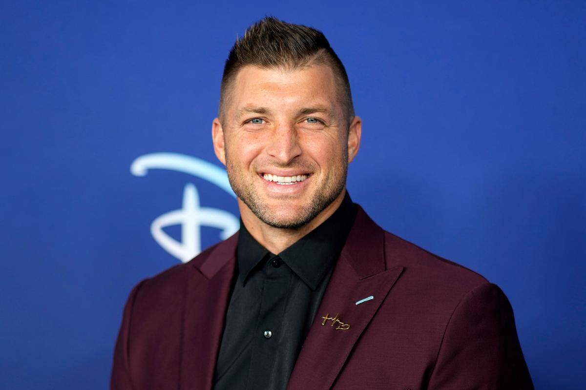 Tim Tebow attends the Disney 2022 Upfront presentation at Basketball City Pier 36 on Tuesday, May 17, 2022, in New York.