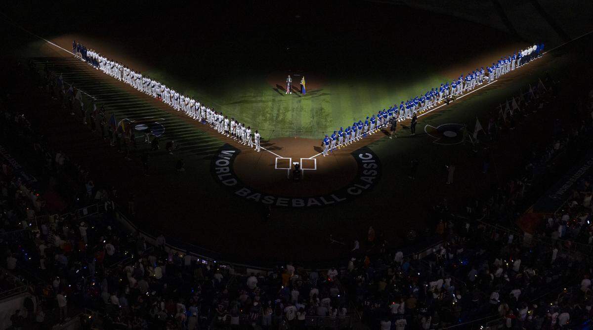 Venezuela and the United States lineup during the opening ceremonies of the World Baseball Classic final game at loanDepot Park on Tuesday, March 17, 2026, in Miami, Fla.