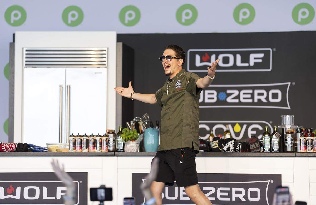 Hunter Fieri reacts as he walks on stage at the Goya Foods' Grand Tasting Village during the Food Network South Beach Wine & Food Festival on Saturday, Feb. 21, 2026, in Miami Beach, Fla.