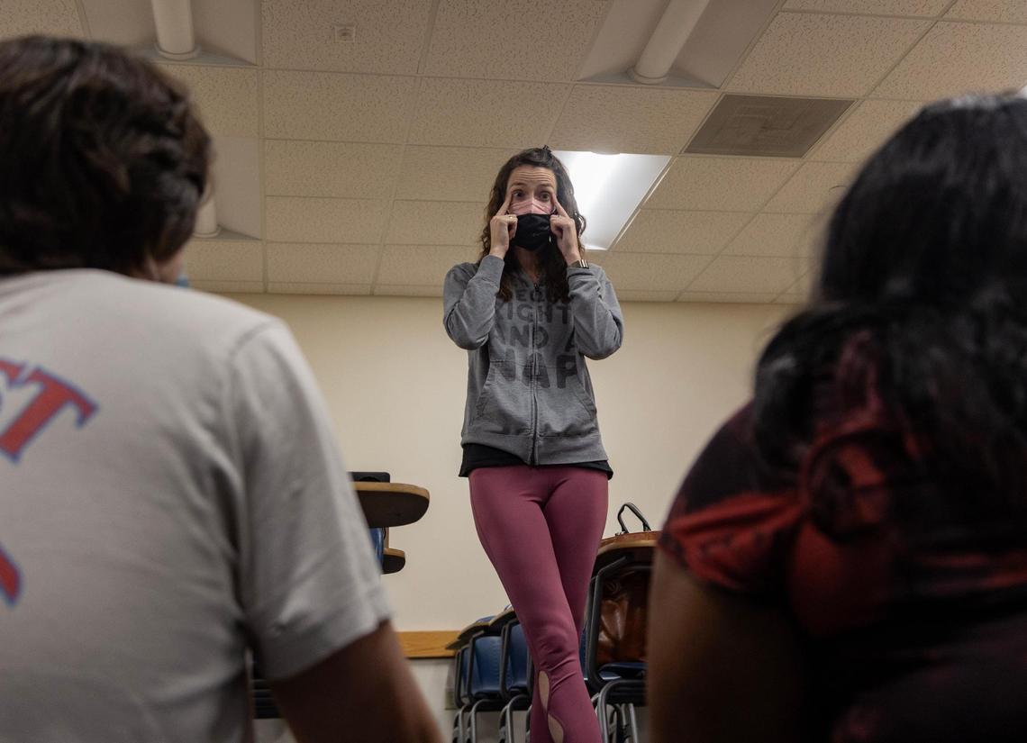 Nicole Perry (middle), intimacy coordinator, instructs actors Samuel Krogh (left) and Noelle Nicholas (right) to maintain eye contact while choreographing a first kiss scene in the play XOXOLOLA by Rachel Greene put on by LakehouseRanchDotPNG on Aug. 9, 2023, at Graham Center on FIU campus. The play ran from September 22 through October 1 this year. “I call them flavors,” Perry said. “I am always saying to the director like ‘What flavor is this kiss? What’s the story that we’re trying to tell here?’ And that’s what we do really with the bodies and the shapes and the time that we’re together with that choreography.”