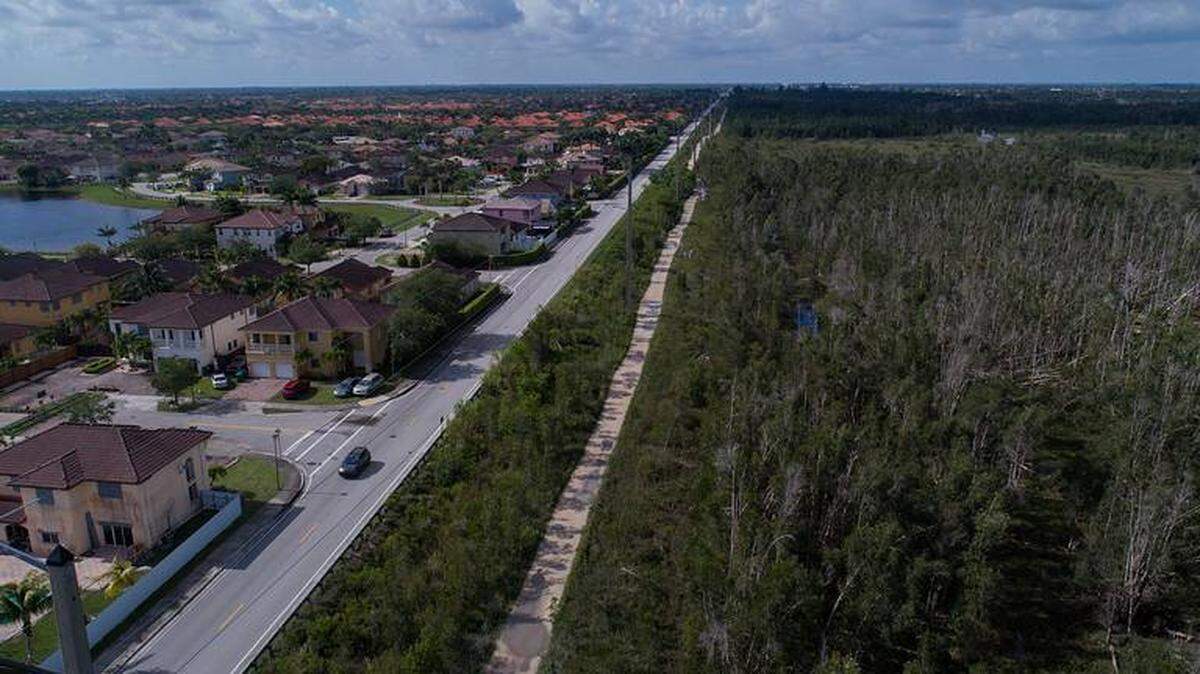 A southbound view of Southwest 157th Avenue running next to the Bird Drive Basin, the proposed route of the controversial 836 State Road extension in Miami-Dade County.