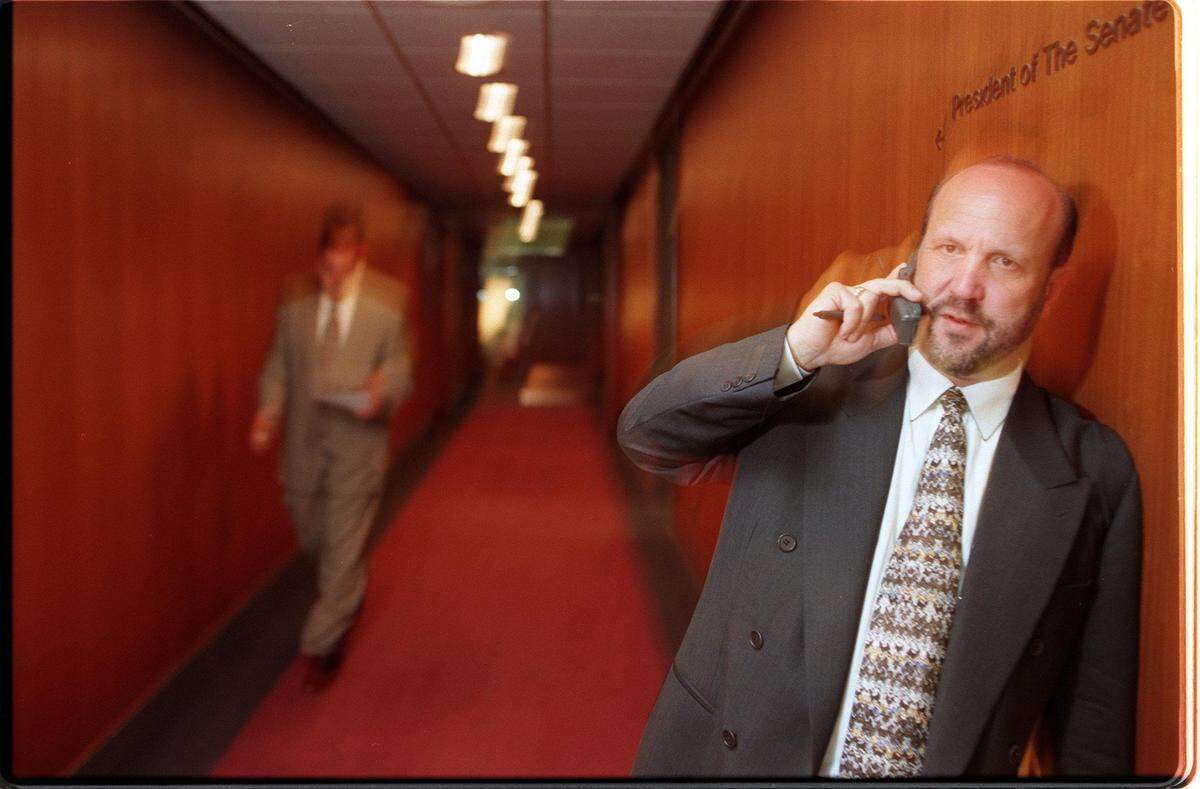 Ron Book on his cell phone outside the Florida Senate in 1998.