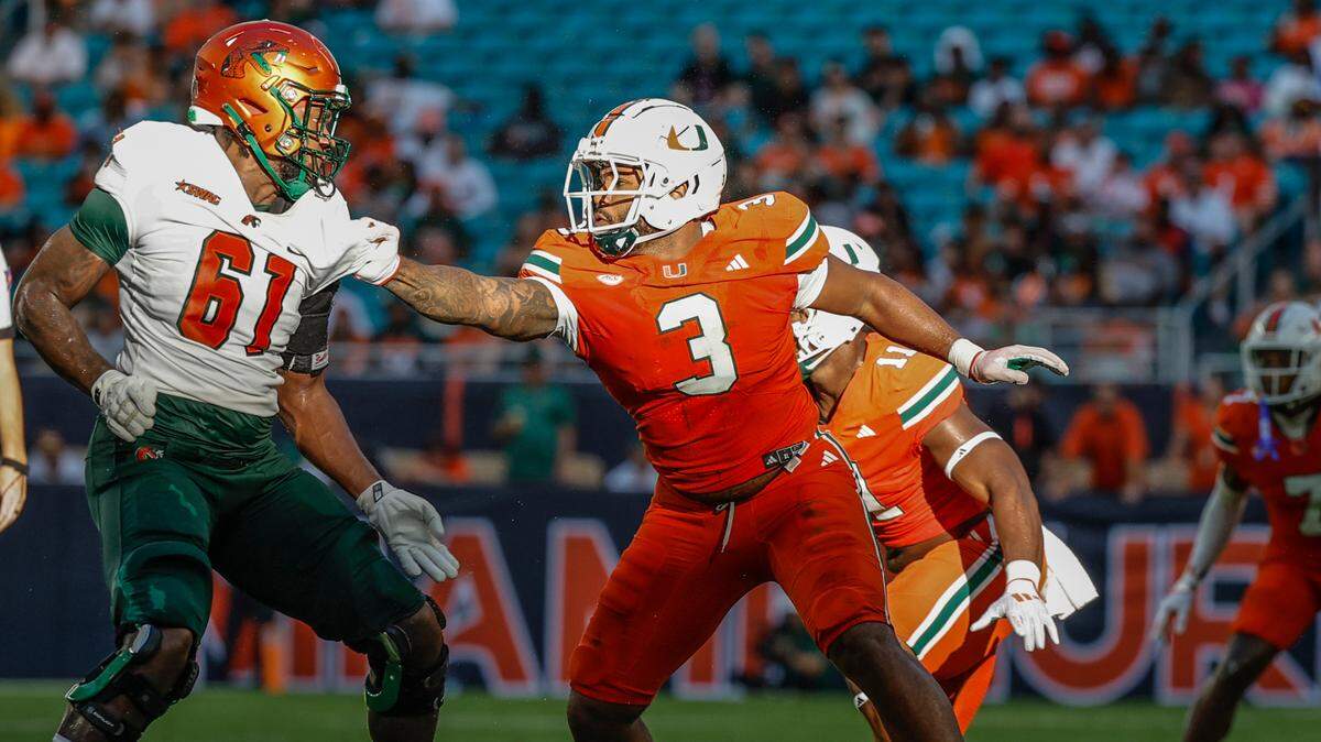 Miami Hurricanes defensive lineman Akheem Mesidor (3) goes up against Florida A&M Rattlers offensive lineman Jalen Goss (61) in the first half at Hard Rock Stadium in Miami Gardens, Florida, on Saturday, September 7, 2024.