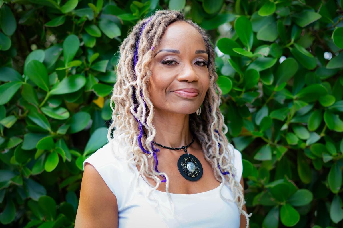 South Florida People of Color founder Roni Bennett poses at her home on Friday, Oct. 30, 2024, in Miami, Fla.