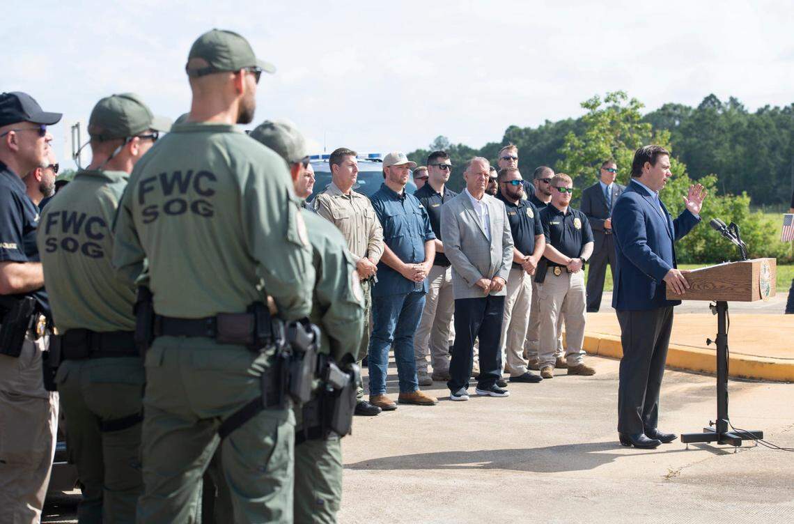 Gov. Ron DeSantis announced 50 state law enforcement officers were deploying to the U.S. southern border to assist Texas and Arizona during a press conference Friday, June 25, 2021, at an I-10 weigh station near Pensacola.