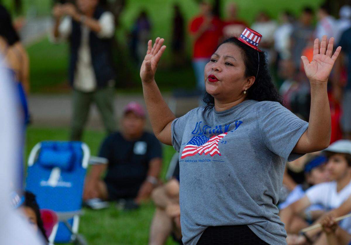 Kaklin Lozano sings and dances to covers of Whitney Houston songs during the Fourth of July Bayfront Park Celebration at Bayfront Park on Tuesday, July 4, 2023 in Miami, Fla.