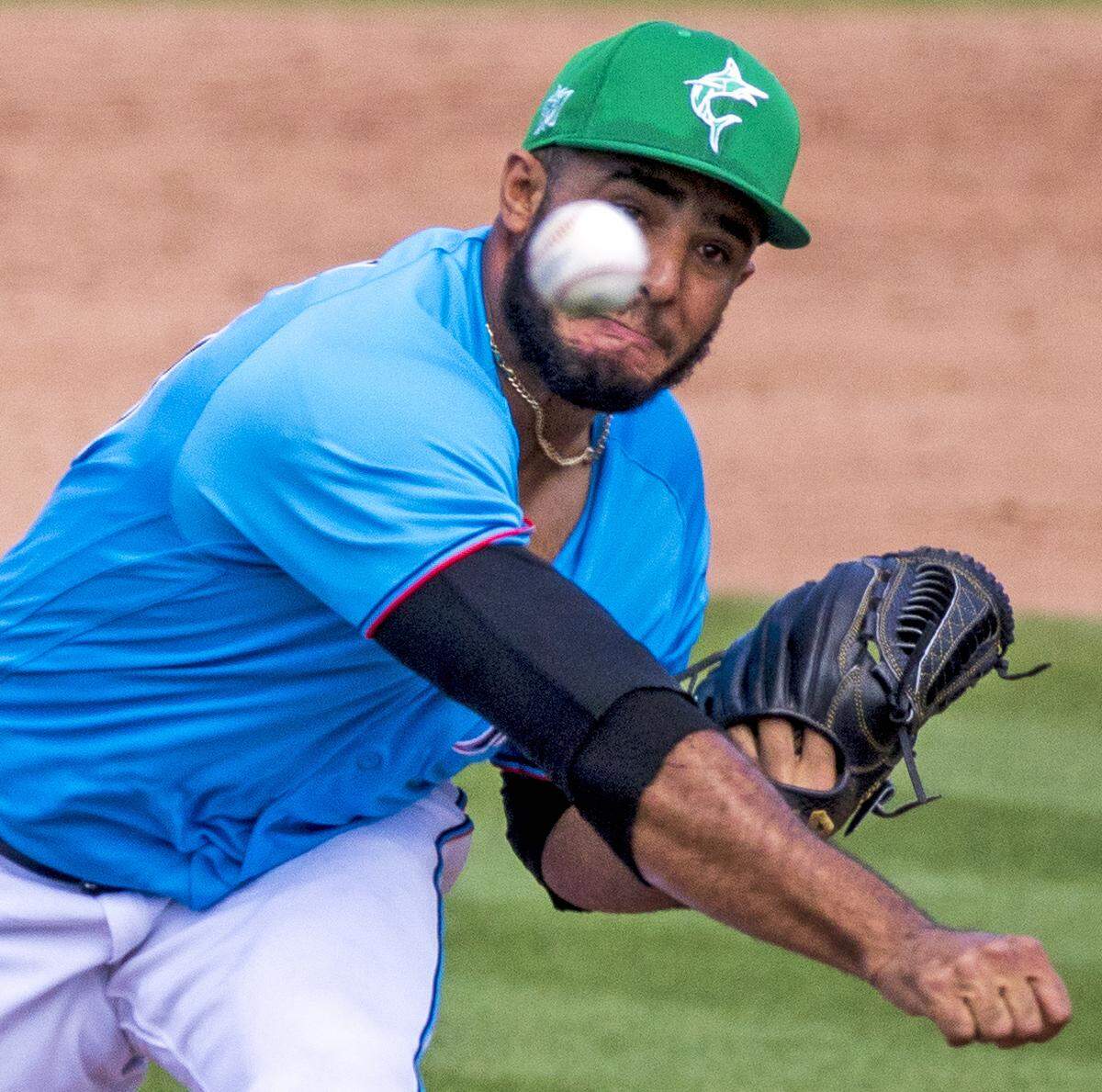 Miami Marlins pitcher Yimi Garcia (93) pitches against the New York Mets during the eighth inning of their spring training baseball game at Roger Dean Chevrolet Stadium on Wednesday, March 17, 2021 in Jupiter, Florida.