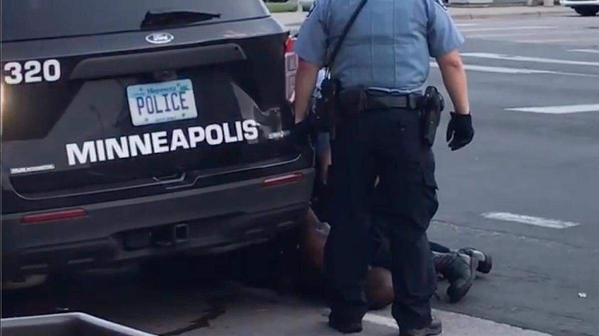 One of several Minneapolis police officers watched as Officer Derek Chauvin kneels on George Floyd’s neck.