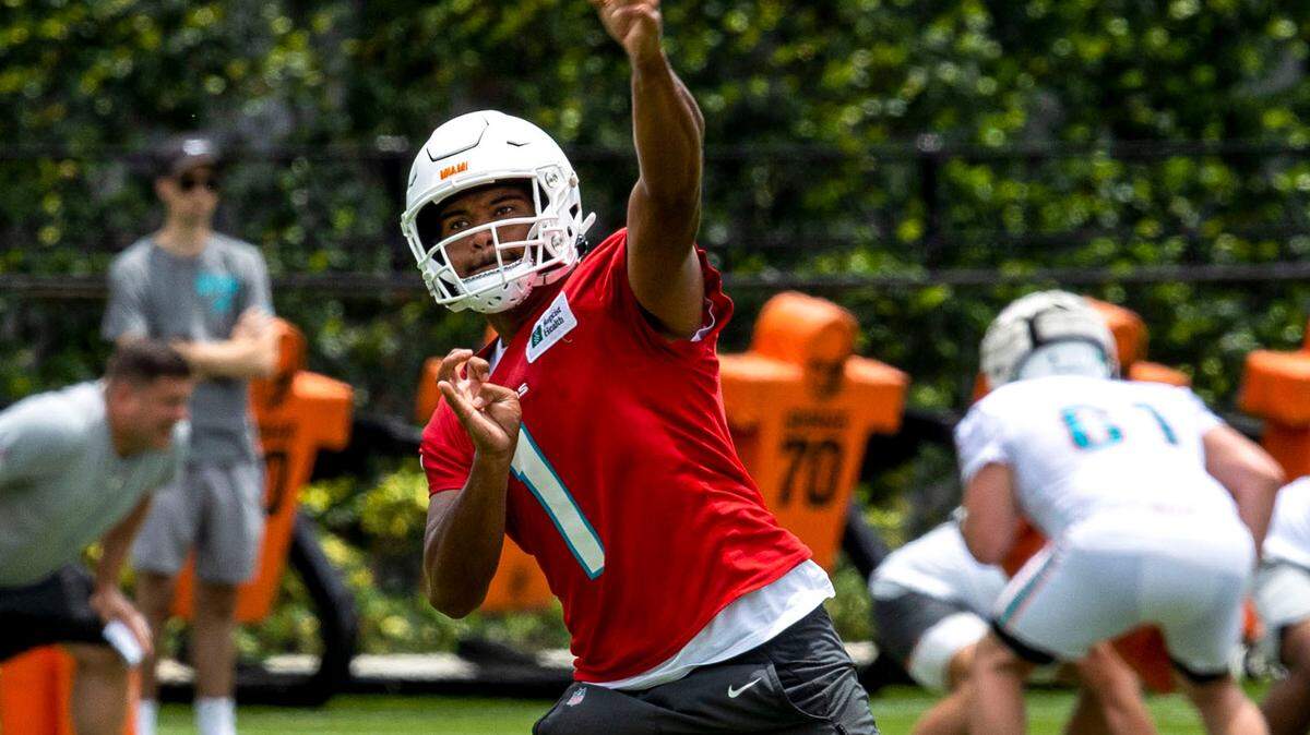 Miami Dolphins quarterback Tua Tagovailoa (1) throws the ball during the final day of OTAs at Baptist Health Training Complex in Miami Gardens, Florida, on Tuesday, June 7, 2022.