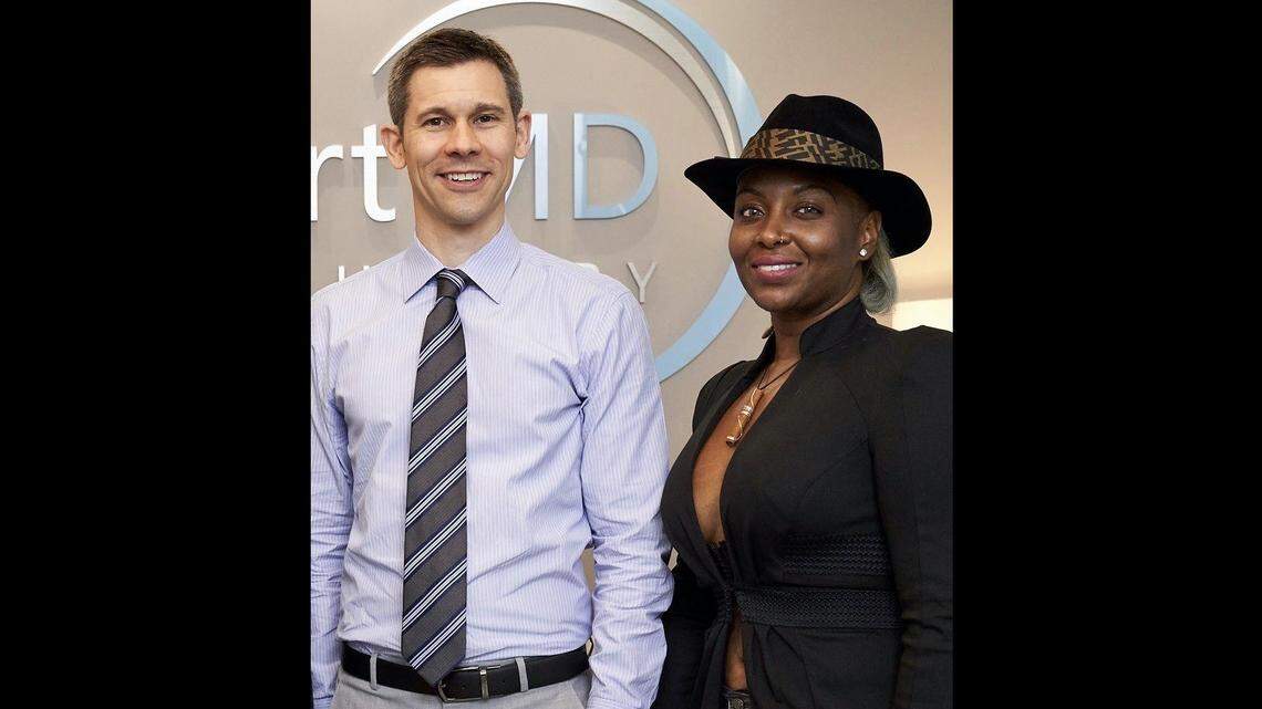 Rachelle Duchatelier and Dr. Joshua Lampert, an Aventura plastic and reconstructive surgeon who recreated her breast through fat grafting.