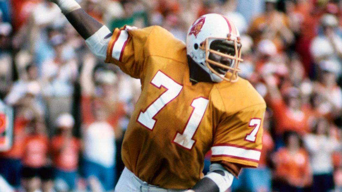 Tampa Bay Buccaneers defensive tackle Randy Crowder (71) reacts after picking up the ball against the Philadelphia Eagles during the 1979 NFC Divisional Playoff game at Tampa Stadium. The Bucs defeated the Eagles 24-17.