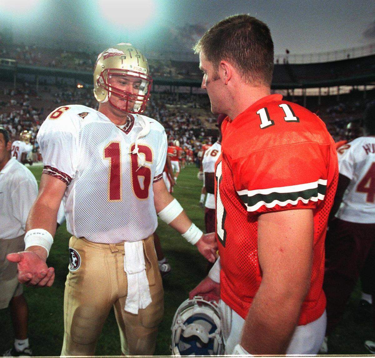 In 1998, FSU QB Chris Weinke greets UM QB Scott Covington after the FSU victory.