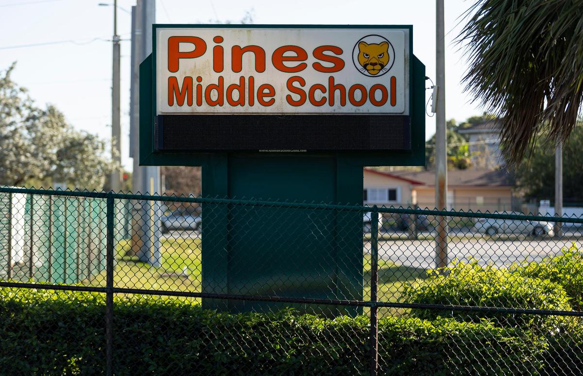 A sign welcomes visitors entering Pines Middle School on Wednesday, Jan. 31, 2024, in Pembroke Pines, Fla. Pines Middle is one of various Broward County Schools with low student enrollment.