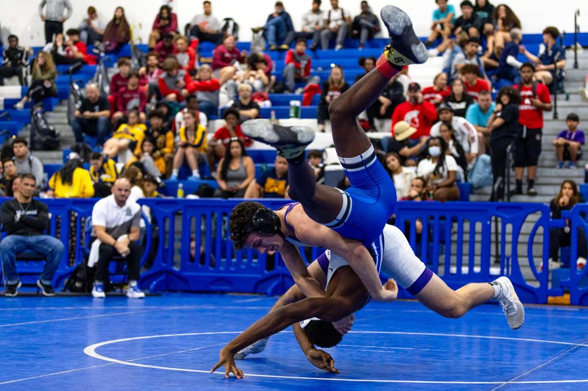 South Dade’s Tyree Graham is slammed by Southwest Miami’s Danny Martinez during the 2023 Boys GMAC Wrestling Championships at South Dade Senior High School in Homestead, Florida, on Saturday, February 4, 2023.