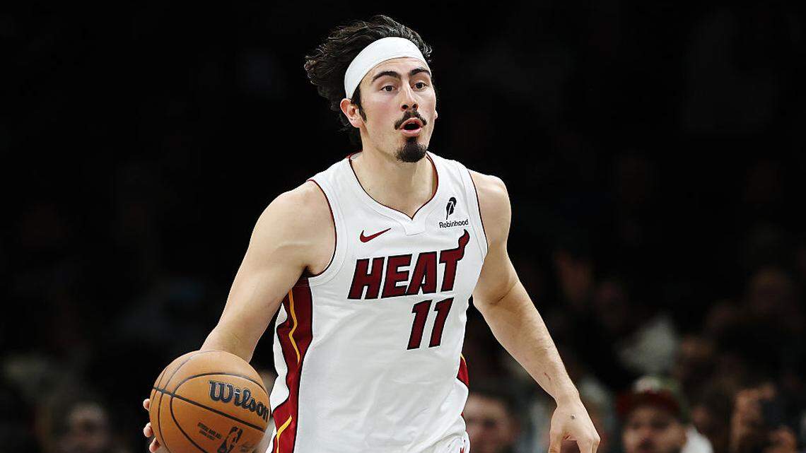Jaime Jaquez Jr. #11 of the Miami Heat dribbles during the second half against the Brooklyn Nets at Barclays Center on December 18, 2025 in the Brooklyn borough of New York City.
