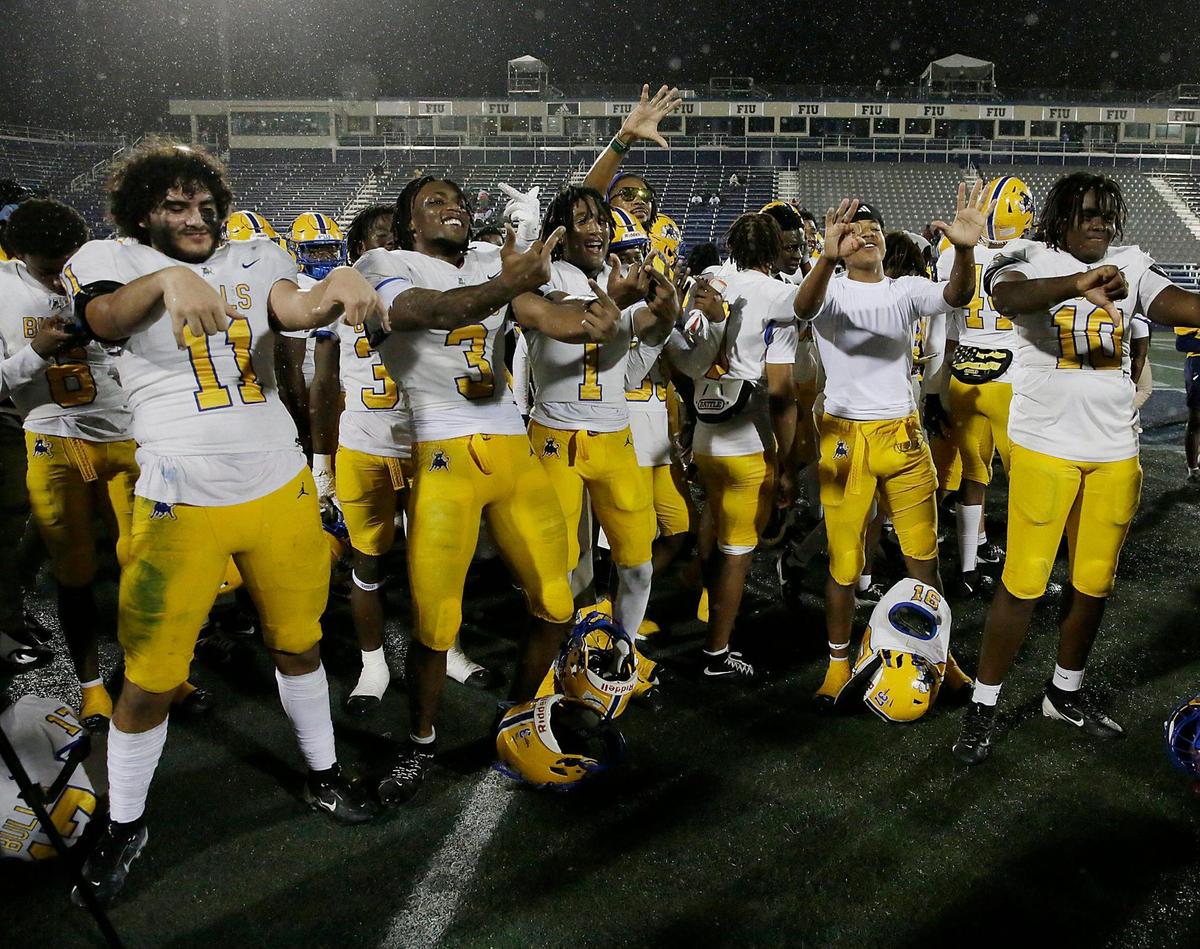 Northwestern Bulls celebrate victory against Raines Vikings (Jacksonville) during Class 3A state championship football game on Saturday, December 14, 2024 at Pitbull Stadium in Miami. Andrew Uloza / for Miami Herald