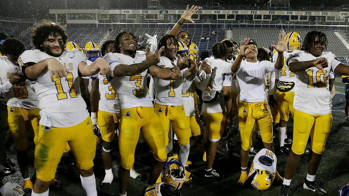 The Northwestern Bulls celebrate their victory against Raines Vikings (Jacksonville) during the Class 3A state championship football game on Saturday, December 14, 2024 at Pitbull Stadium in Miami. 