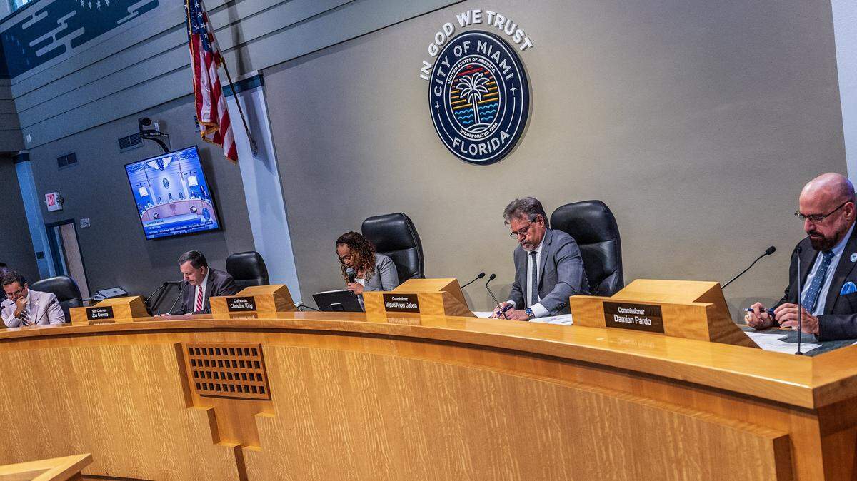 From left-City of Miami Commissioners Ralph "Rafael" Rosado, Vice Chairman Joe Carollo, Chairwoman Christine King, Miguel Angel Gabela and Damian Pardo, during a Commission meeting to discuss the proposed sale of the Olympia Theater at the Gusman Center for the Performing Arts' entire building to a public charter school, called Sports Leadership Arts Management, (SLAM), at City Hall, on Thursday September 25, 2025.
