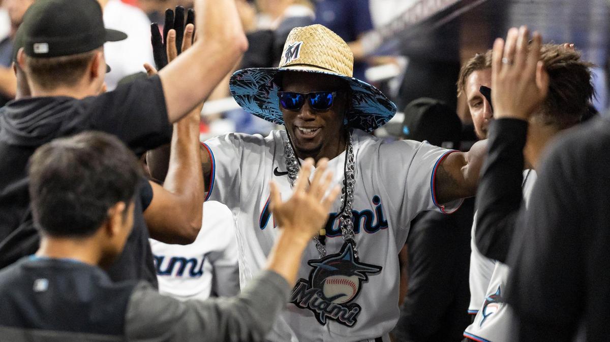 Miami Marlins left fielder Jorge Soler (12) celebrates with his teammates after scoring a home run against the San Francisco Giants in the seventh inning of an MLB game at loanDepot park on Monday, April 17, 2023, in Miami, Fla.