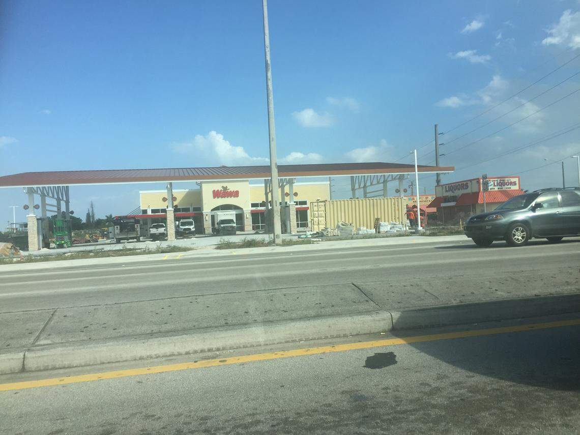 As a Davie officer approached, the report says, the suspect jumped out and ran north, toward the Happy Pappy Liquor Store. The officer pursued as the suspect cut through the parking lot of a Wawa under construction, shooting at the officer with what police said shells identified as a .45. This is the area where the incident happened.