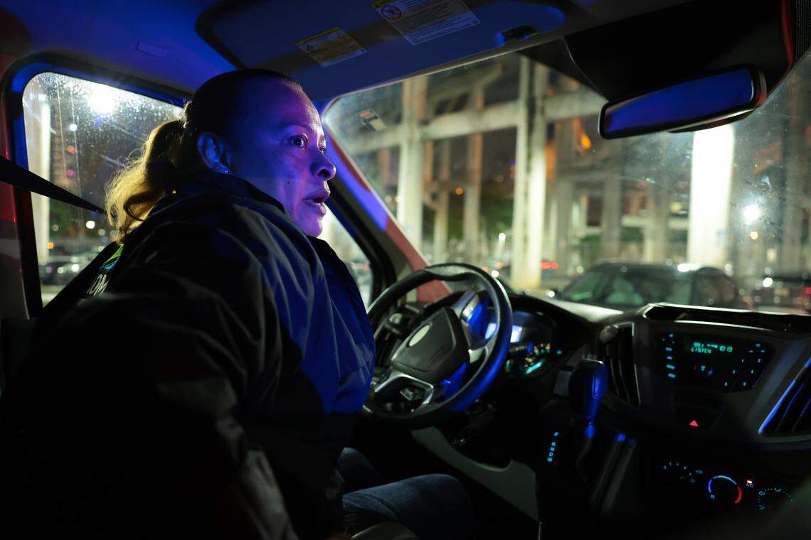 Katherine Martinez, assistant to the director of homeless services for Miami-Dade, drives through downtown looking for people experiencing homelessness during the Homeless Trust's biannual Homeless Census in Miami on Thursday, Jan. 22, 2026.