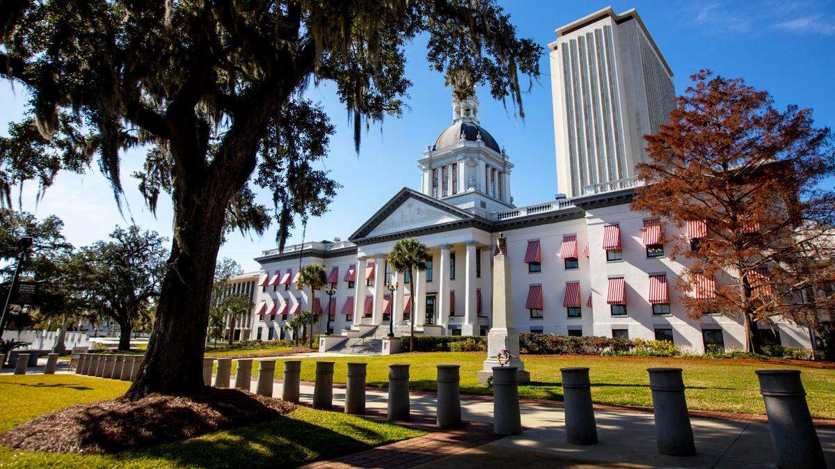 The Old Historic Florida State Capitol building in Tallahassee, Florida, on Monday, December 14, 2020. The current Capitol, a modern office building, looms in the rear.