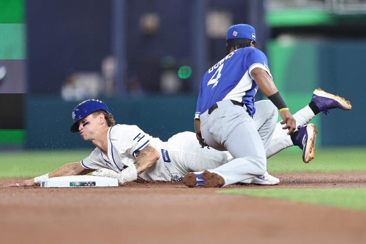 Cole Carrigg #8 of the Israel steels second base ahead of Jeter Downs #4 of the Nicaragua during the second inning at loanDepot park on March 08, 2026 in Miami, Florida. 