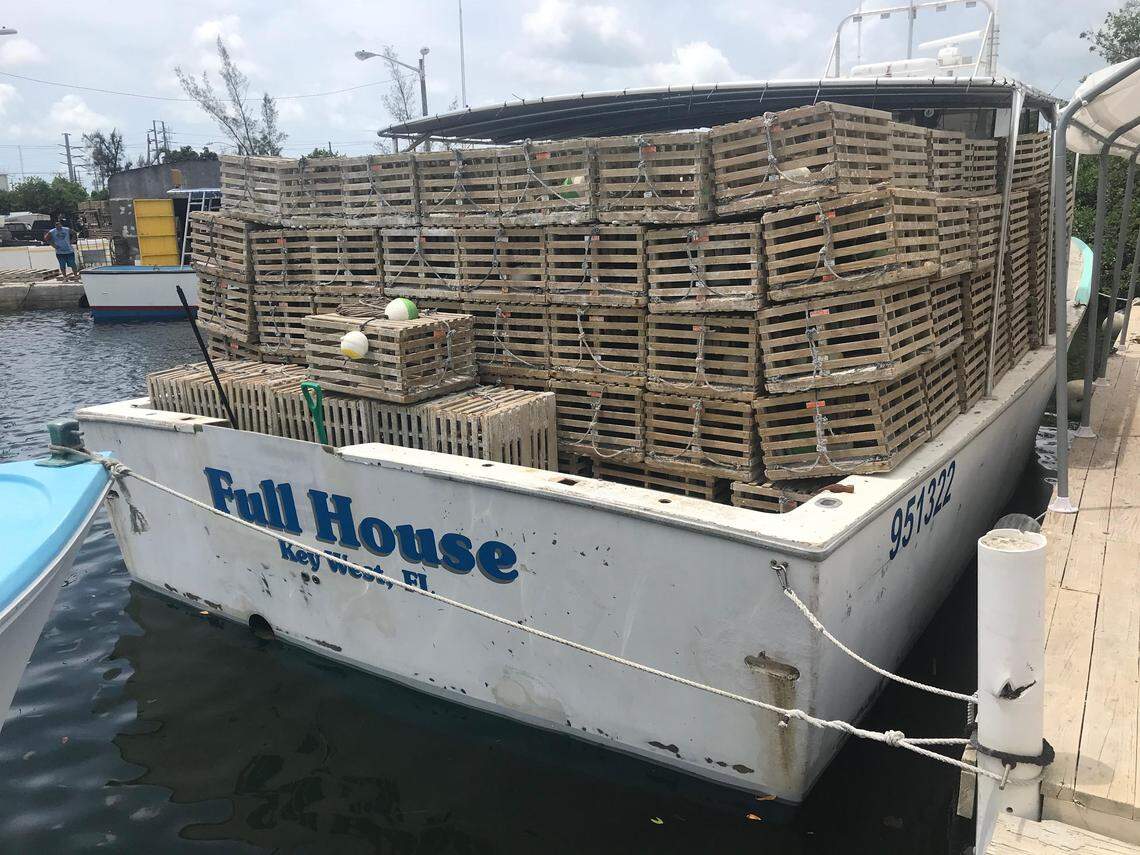 The Full House, a commercial lobster boat docked in Stock Island in the Lower Keys, sits full of traps in August, the beginning of the 2018-2019 spiny lobster season.